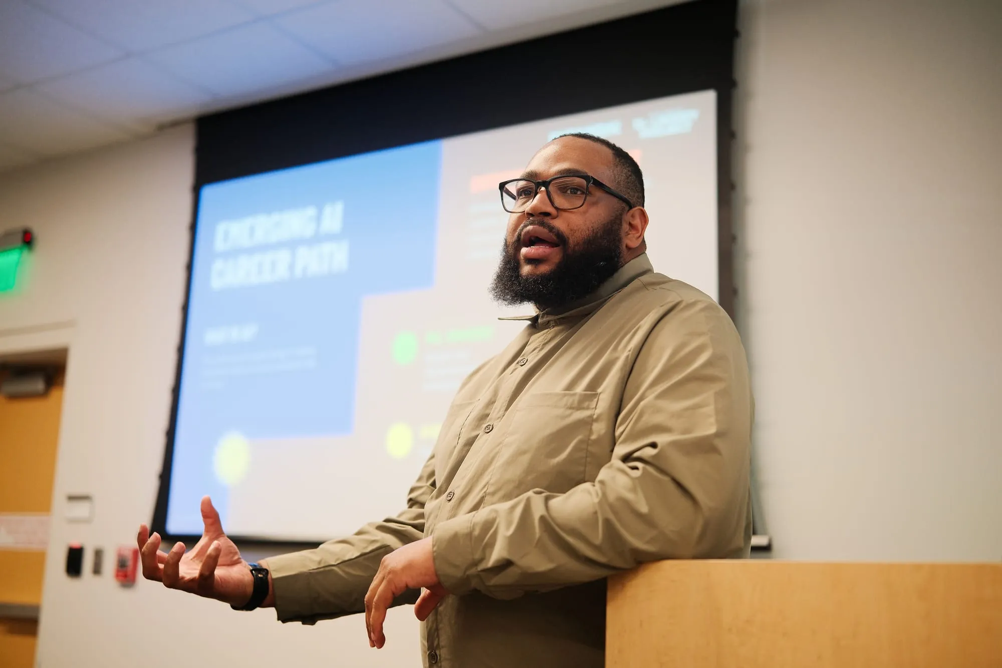 Marlon Avery teaching an Emerging AI Career Path session from a lectern